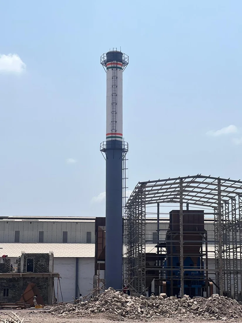 RCC chimney with surrounding industrial steel framework
